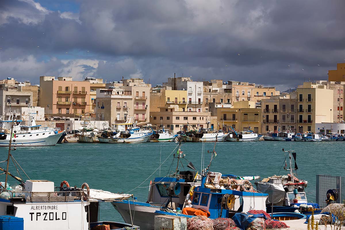 Locking the harbour where Peter III of Aragon landed in 1282, Trapani still gives the impression of simple Sicilian authenticity. .