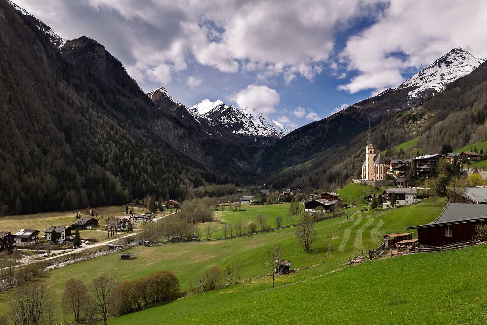 The Grossglockner High Alpine Road connects Bruck in the state of Salzburg with Heiligenblut (seen on the photo) in Carinthia.