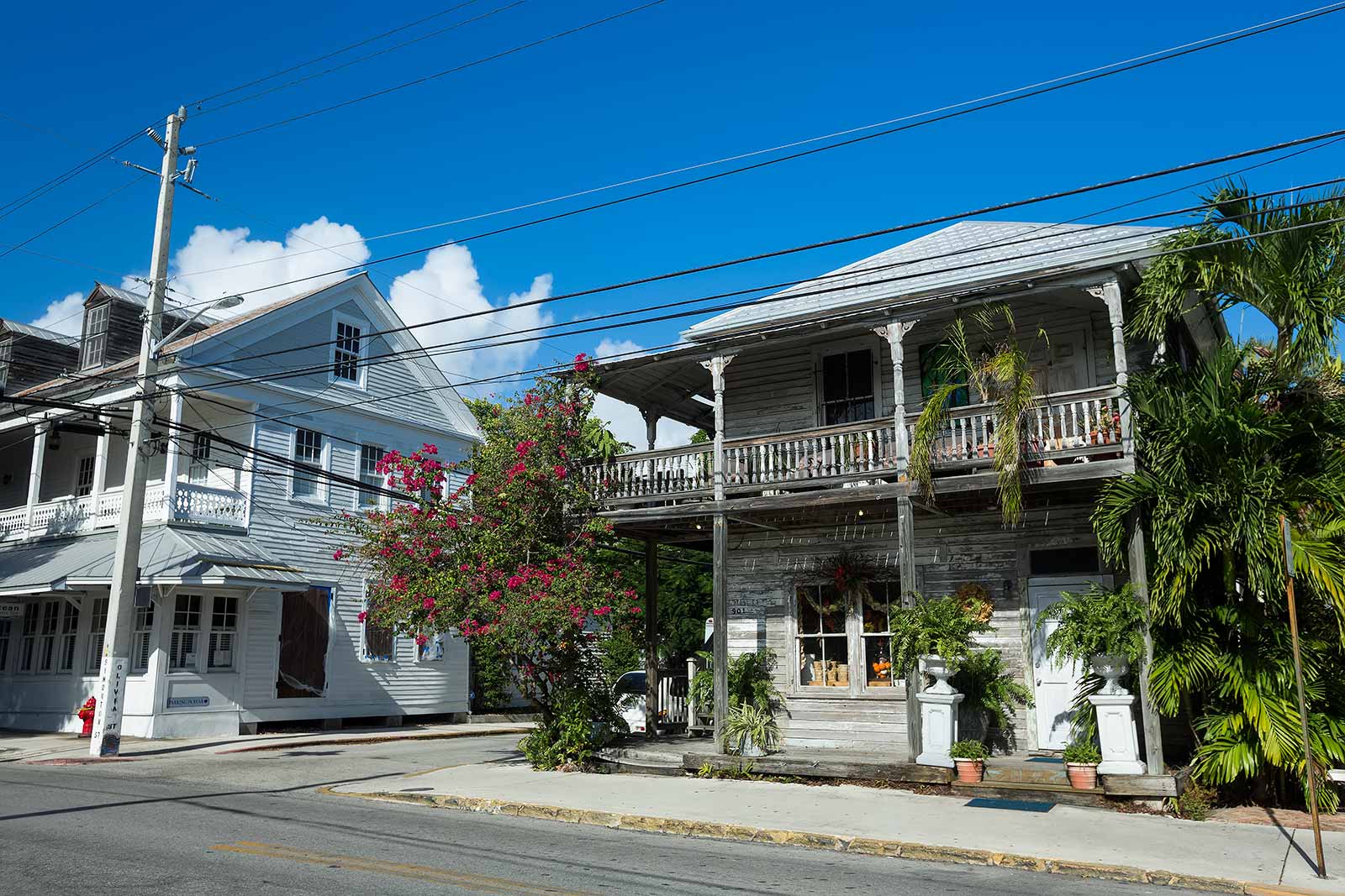 Louvered shutters protect against severe tropical heat while encouraging air circulation inside the home. A full-sized front porch creates a perfect shady spot to enjoy the outdoor view.