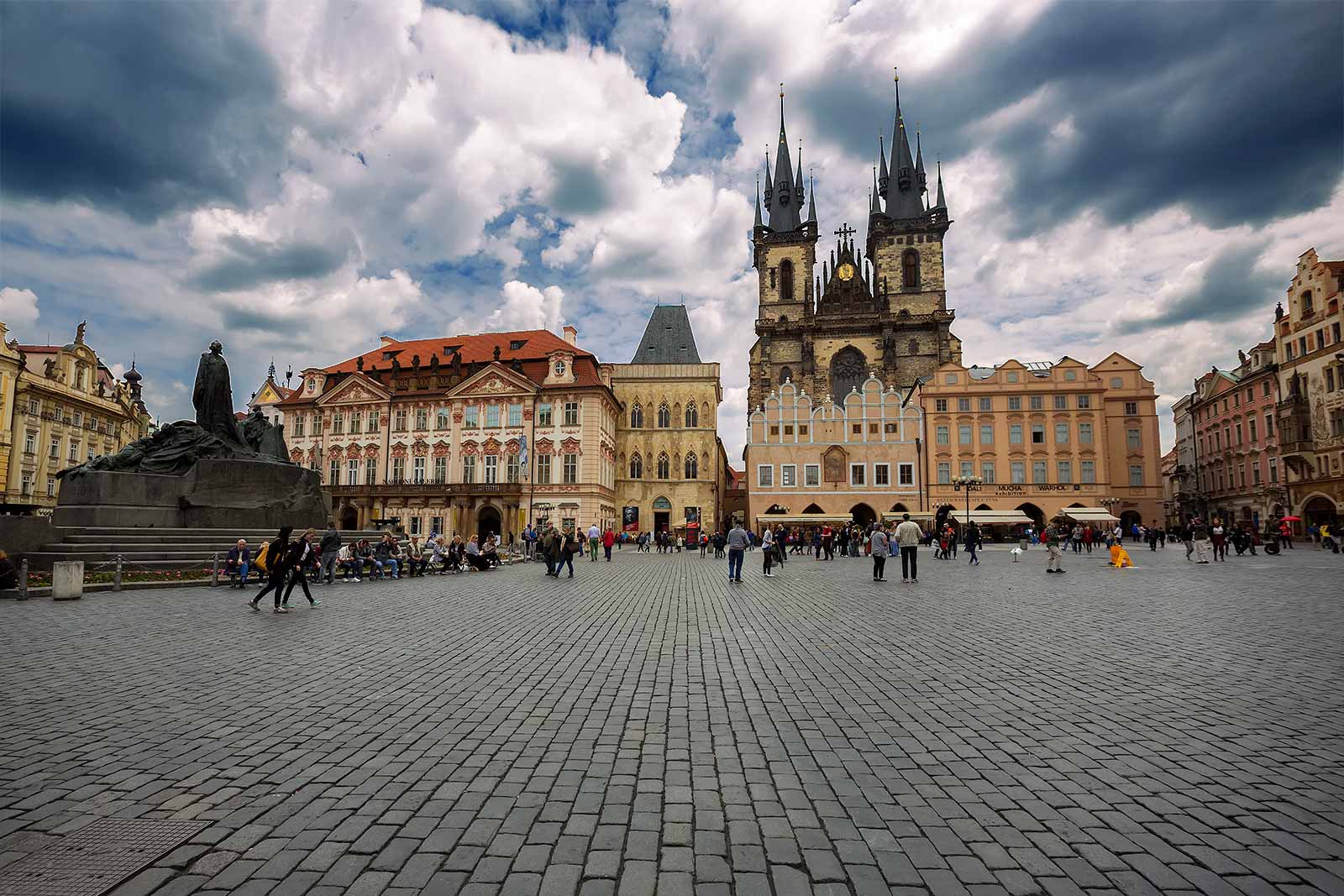 The most notable sights on the square are the Old Town Hall Tower & Astronomical Clock, Tyn Church and St. Nicholas Church. At the centre (left in this photo) of the Old Town Square is the Jan Hus statue.