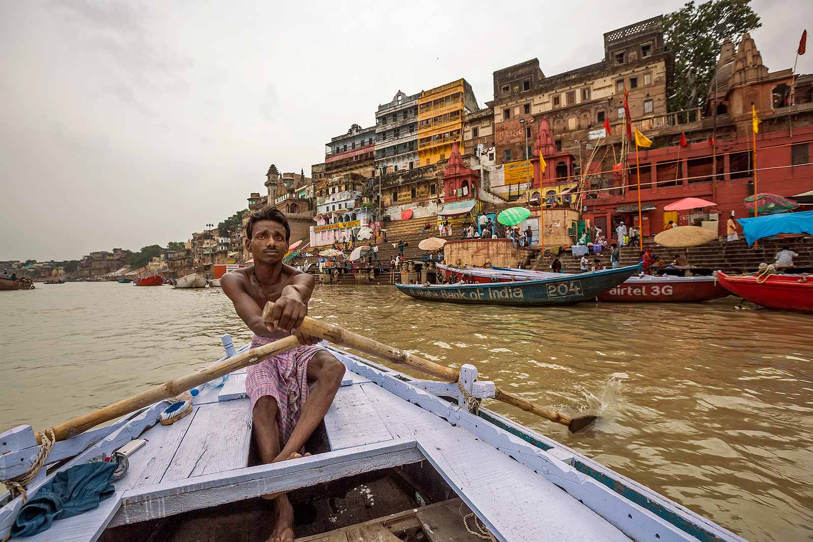 A boat ride along the Ganges river is essential for a real Varanasi experience.