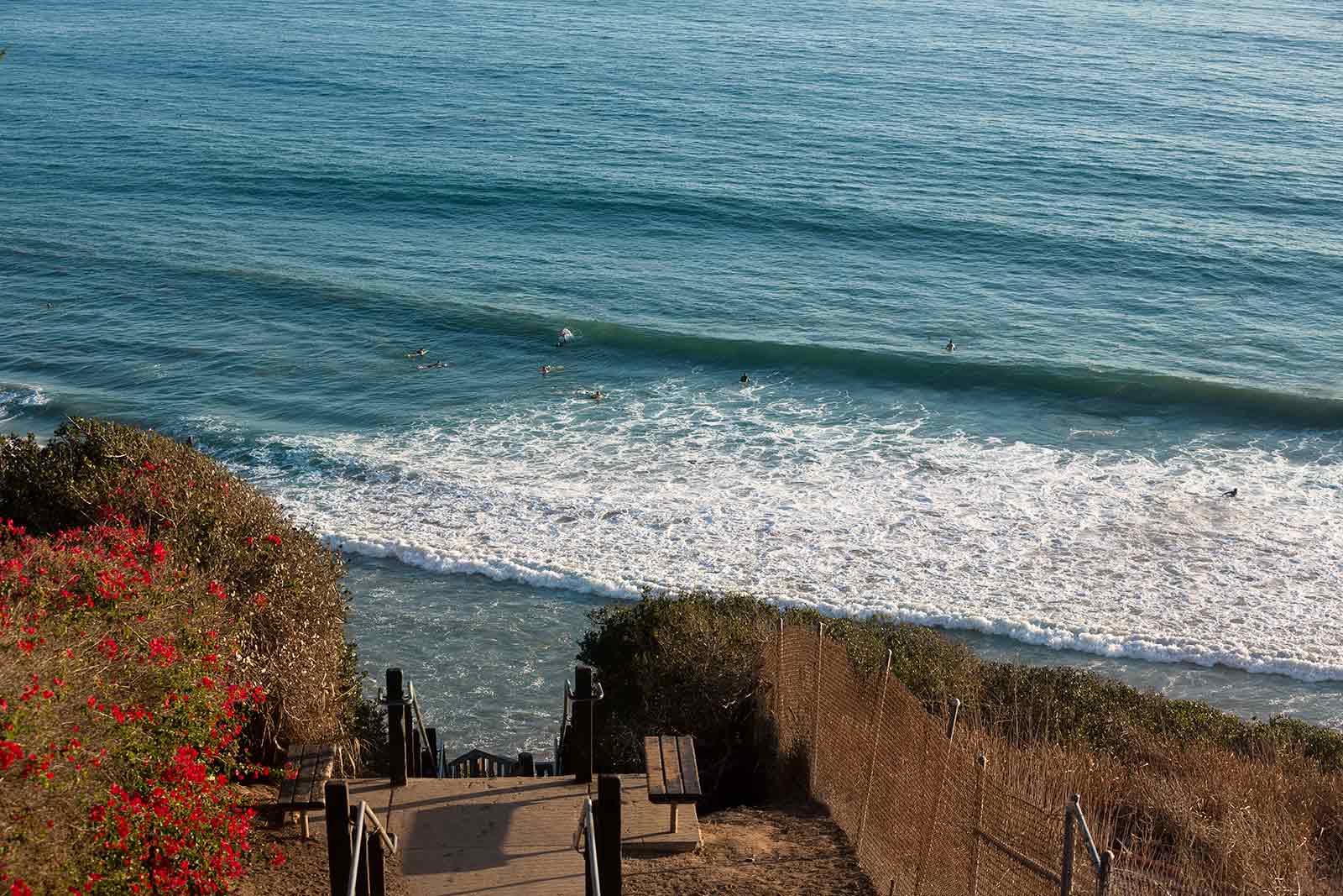 Watching the surfers while walking along the coastline of Santa Barbara can be really relaxing.