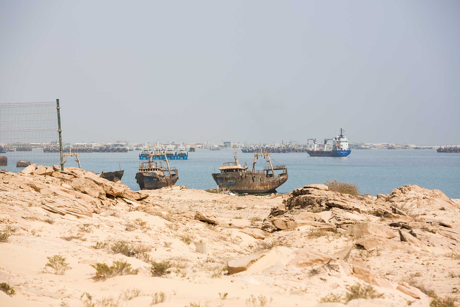 The view off the coast of Mauritania’s Bay of Nouadhibou used to be spotted with rusting hulks in every direction. Today, this Ship Breaking Yard  is almost gone, due to an injection of capital from the Chinese.