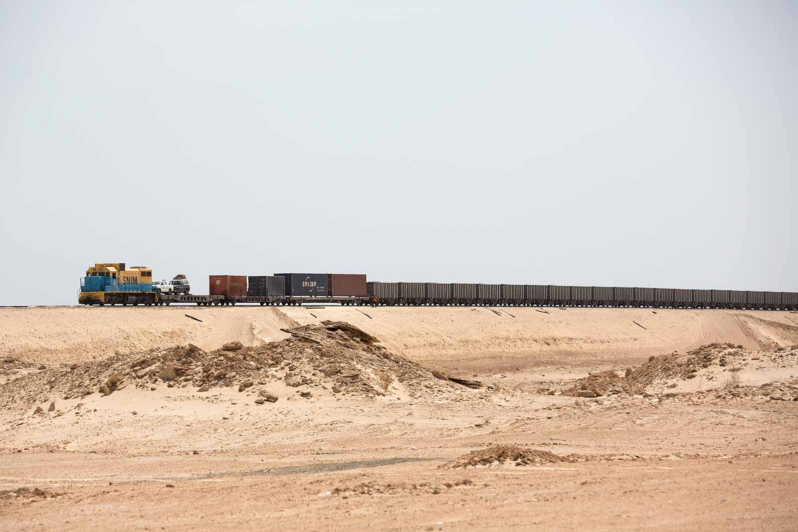 Two or three trains make a daily departure to pick up iron ore from a mine in Eastern Mauritania.